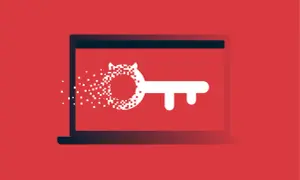 Klucz z pikseli rozpadający się na ekranie laptopa, symbolizujący zagrożenie typu hacktool win32.