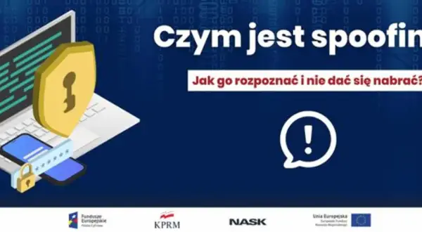Czym jest spoofing? Grafika przedstawia laptop, telefon i tarczę z kluczem, symbolizujące bezpieczeństwo. Jak go rozpoznać i nie dać się nabrać?