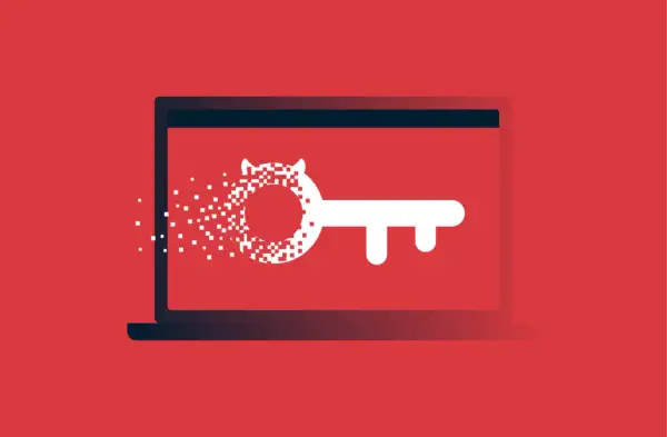 Klucz z pikseli rozpadający się na ekranie laptopa, symbolizujący zagrożenie typu hacktool win32.